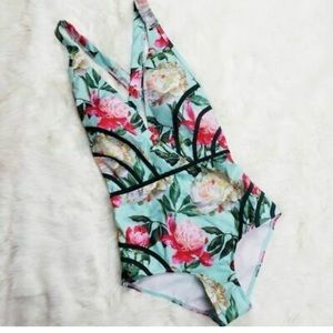 ModCloth “The Gilda” floral print one piece. Size Large